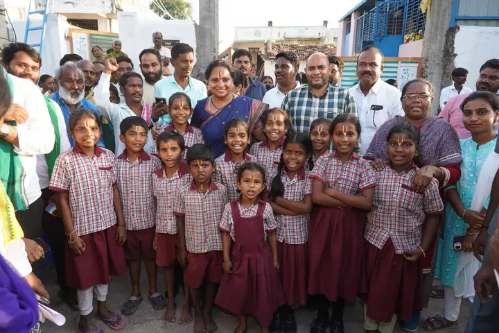 With the school and the village