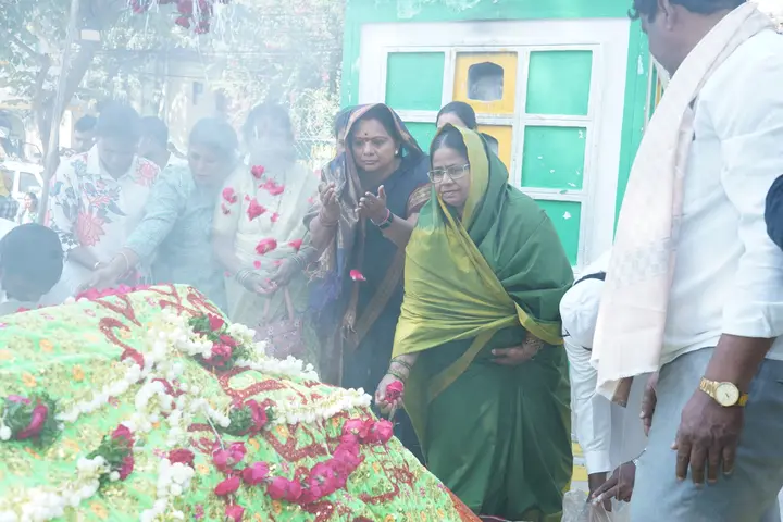 Offering flowers at the shrine